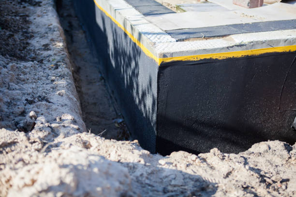 Professional Interior Drainage System technician working in East Aurora, NY